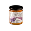 short glass jar with a label including purple organic artwork, that reads "lavender honey"